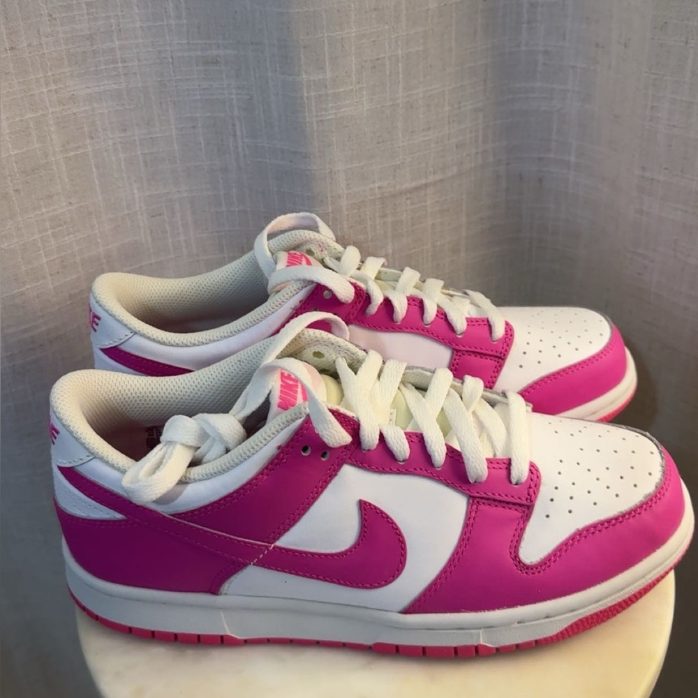 Fuchsia and White Low-Top Nike Dunks.